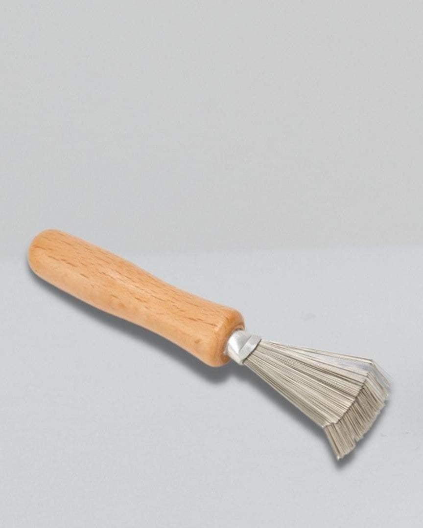 Limpiador de Cepillos y Peines